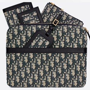 DiorTravel pouch with accessories 
Blue Dior Oblique Jacquard